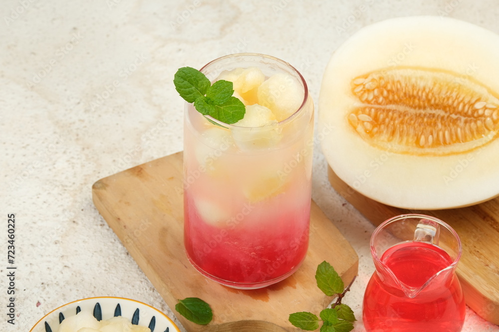 Es Timun Suri is an Indonesia cold fruity drink with red coco pandanus syrup. Es Timun Suri is an Indonesia cold fruity drink with red coco pandanus syrup.