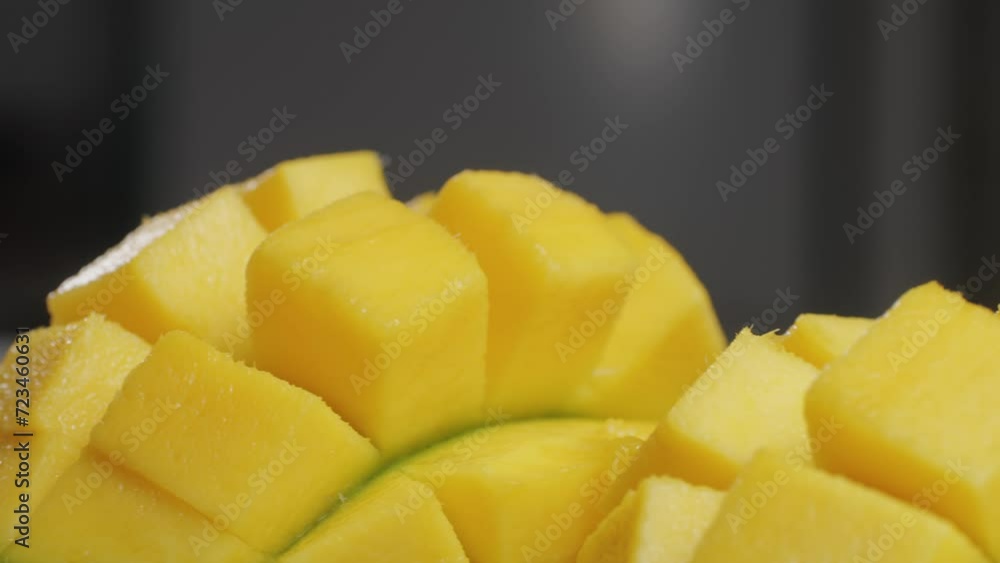 Close up rip mango slice cubes cut Close up rip mango slice cubes cut