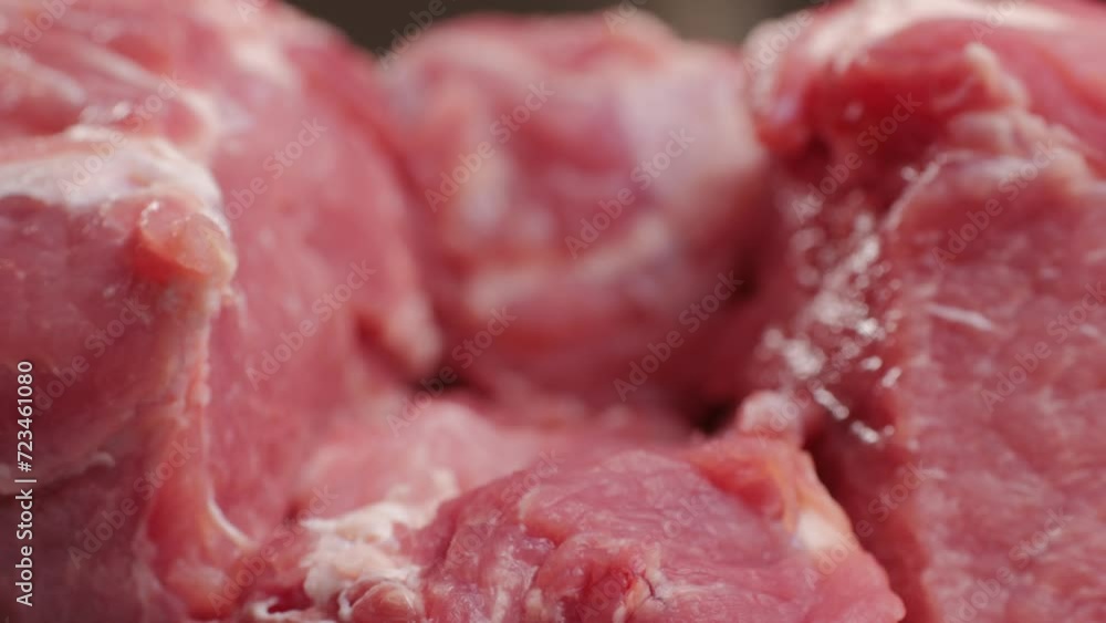 Chef Butcher cutting pork meat with knife on kitchen, cooking Mexican traditional food. Man cut big beef piece for barbecue bbq. Chef Butcher cutting pork meat with knife on kitchen, cooking Mexican traditional food. Man cut big beef piece for barbecue bbq.
