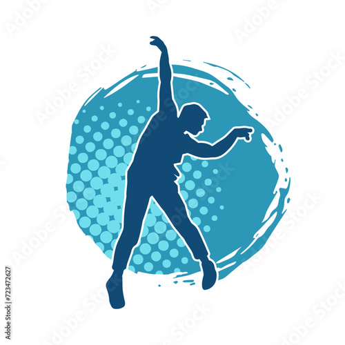 Silhouette of a slim man dancing pose. Silhouette of a male dancer in action pose.