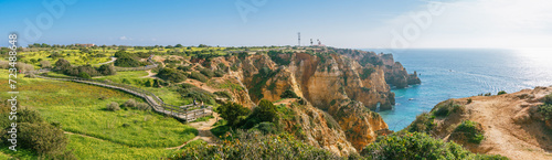 Picturesque cliff walk along the Lagos coastline, Algarve, Portugal. Pano