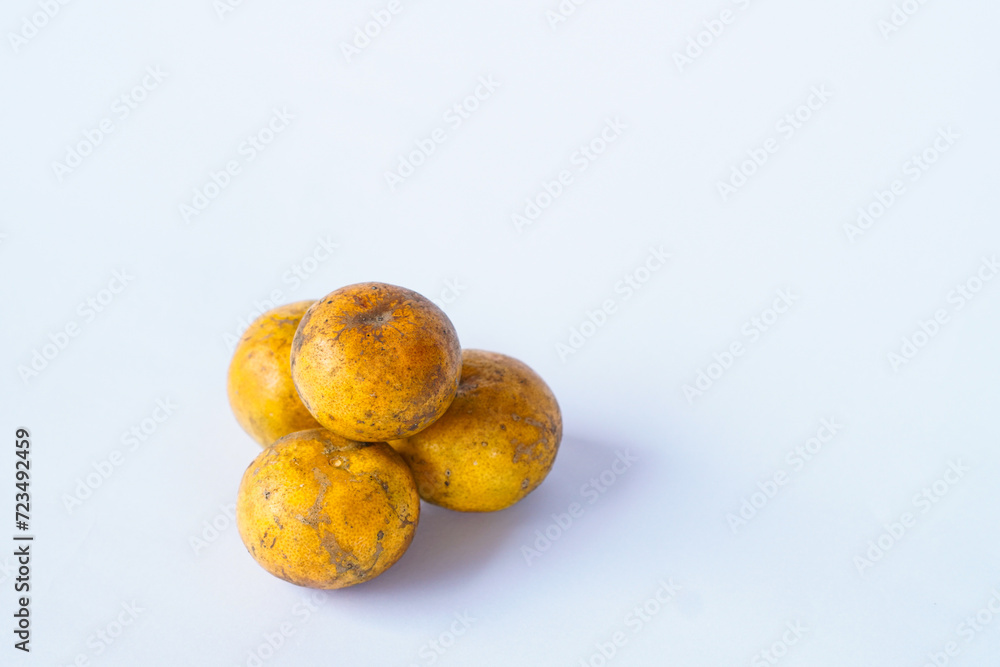 Pile of ripe oranges isolated on white background. Healthy food Pile of ripe oranges isolated on white background. Healthy food