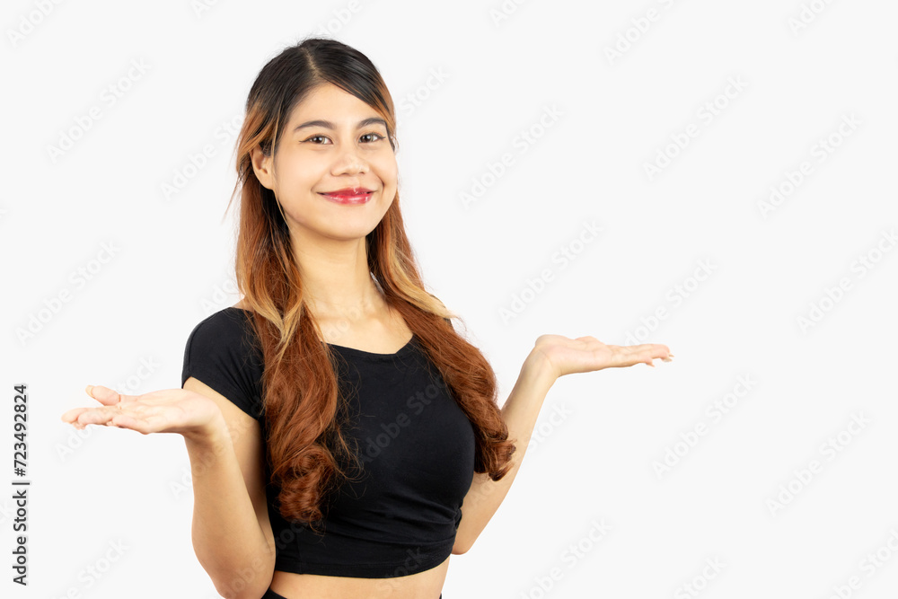 young asian woman long hair style in black t shirt posing hand presenting pointing isolated on white background. young asian woman long hair style in black t shirt posing hand presenting pointing isolated on white background.