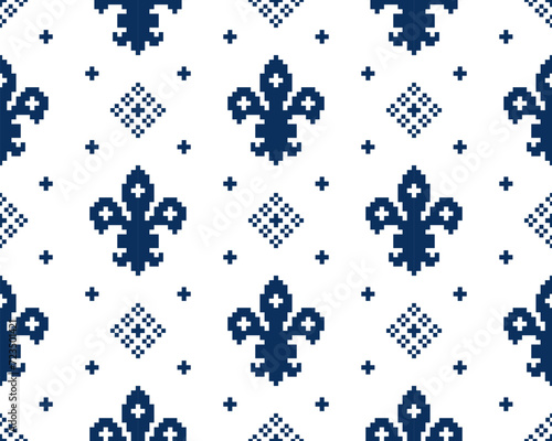 Fleur de lis seamless pattern.Classic royal embroidery vintage style.Traditional and little more modern. Flower with French origins.Vector illustration blue and white background design for decor.