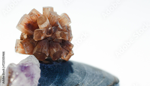 Natural Rough Orange Aragonite Starburst Cluster and Natural Polished Super Seven 7 Melody Stone Metaphysical Healing Crystal Gemstone Mineral Formation Sitting on top of Blue Mussel Shell