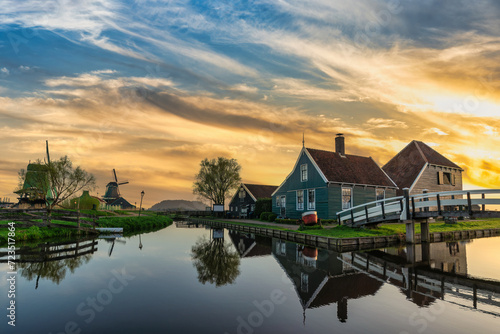 Sunrise at Zaanse Schans village with Dutch Windmill near Amsterdam Netherlands