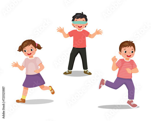 Happy children playing blindfolded tag game
