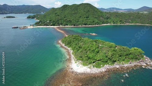 Sai Kung Sharp Island Sand Levee, natural beauty and geo heritage, rock were sculpted into by weathering processes and wave erosion in Kiu Tsui Chau Country Park, Hong Kong, aerial drone sky view photo