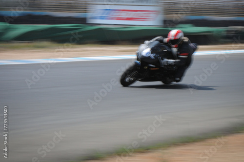 Extreme athlete Sport Motorcycles Racing on race track © Michalis Palis