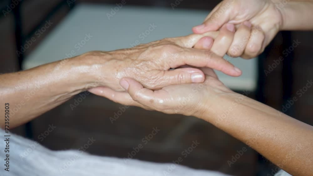 masseuse female physio therapist perform hand relaxing and carpal tunnel relief massage to senior 60s 70s caucasian short haired woman in spa setting masseuse female physio therapist perform hand relaxing and carpal tunnel relief massage to senior 60s 70s caucasian short haired woman in spa setting