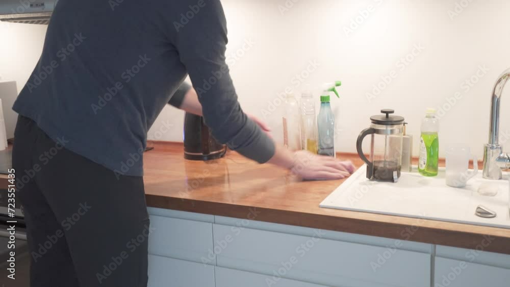 Modern Man Cleaning Kitchen - Crop Static Modern Man Cleaning Kitchen - Crop Static