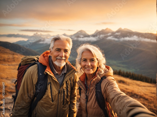 A old romantic couple hiking together in the mountains in the vacation trip week. walking in the beautiful European nature