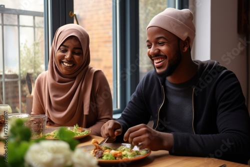 A Young Arab Man and Woman Enjoying a Meal Together