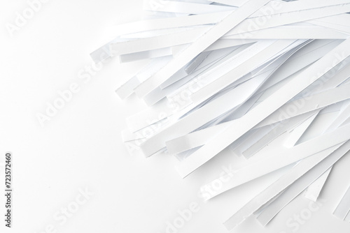 Shredded paper on white background close up