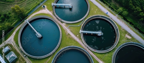 Aerial perspective of purification tanks at contemporary wastewater facility