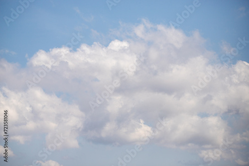 Fototapeta Naklejka Na Ścianę i Meble -  White large clouds against a blue sky.