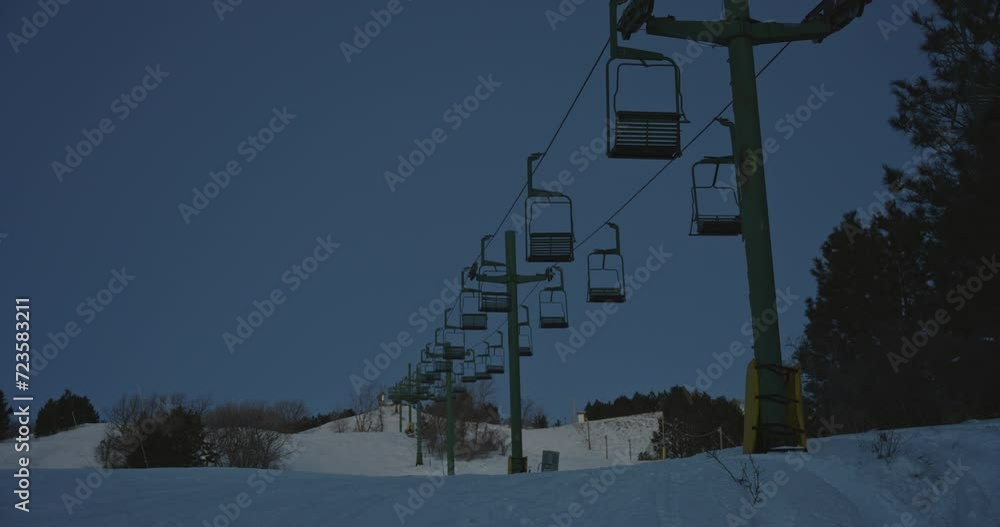 Shot of Chair Lifts on Ski Hill at Huff Hills near Mandan, North Dakota at Dusk. Still shot Shot of Chair Lifts on Ski Hill at Huff Hills near Mandan, North Dakota at Dusk. Still shot
