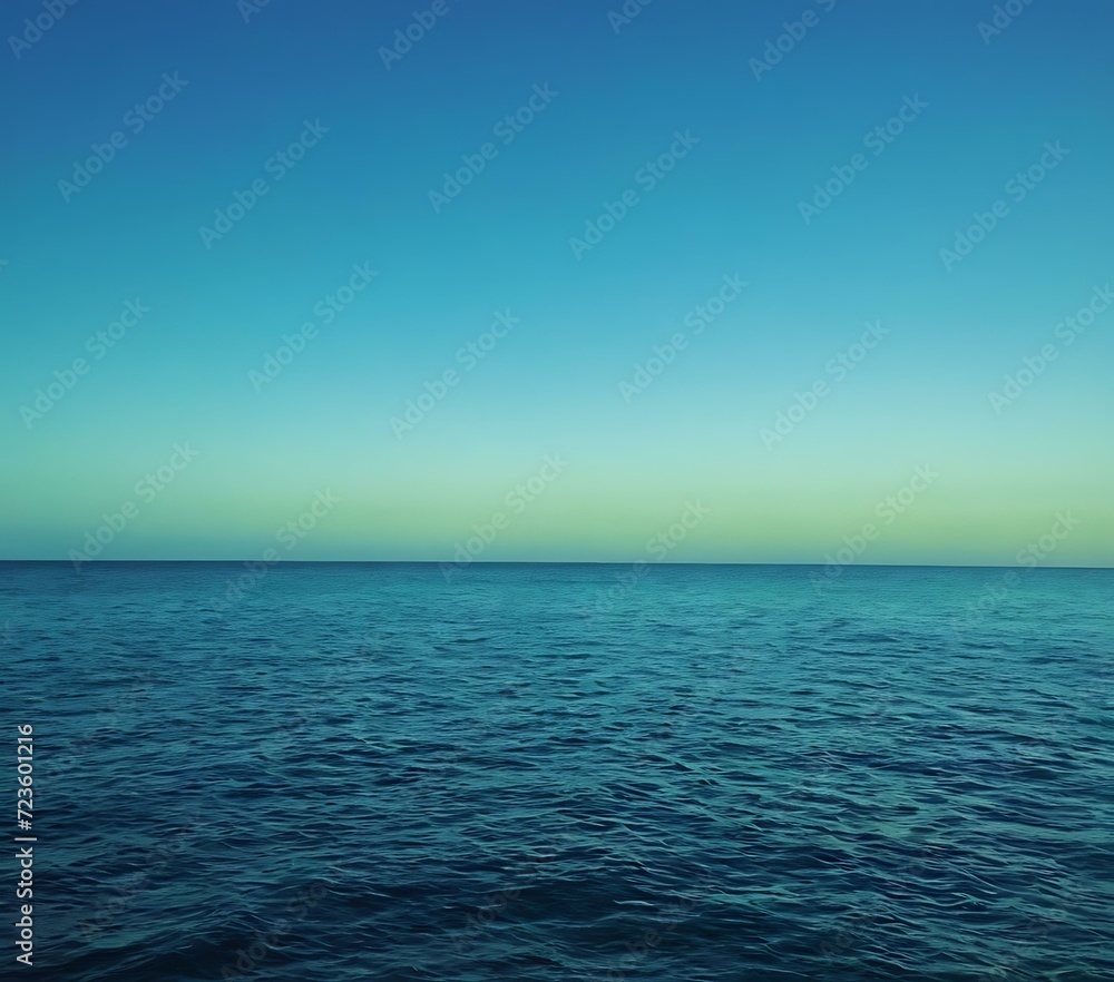 Calm oceanic gradient from deep blue to seafoam green