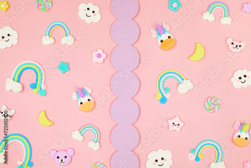 Trendy pastel pink kawaii background with cute air plasticine handmade cartoon animals, unicorns, stars, rainbows pattern. Top view, flat lay. Candycore, fairycore.
