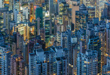 Aerial view of crowded high rise building in Hong Kong city at night