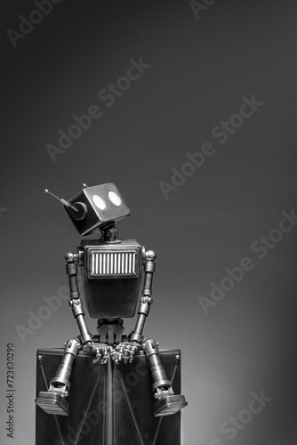 Humanoid robot on a dark background. Concept of the future of artificial intelligence and the fourth industrial revolution.