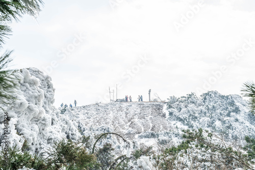 Rime and snow scene at Zigaifeng, Hengshan Mountain, Nanyue, China photo