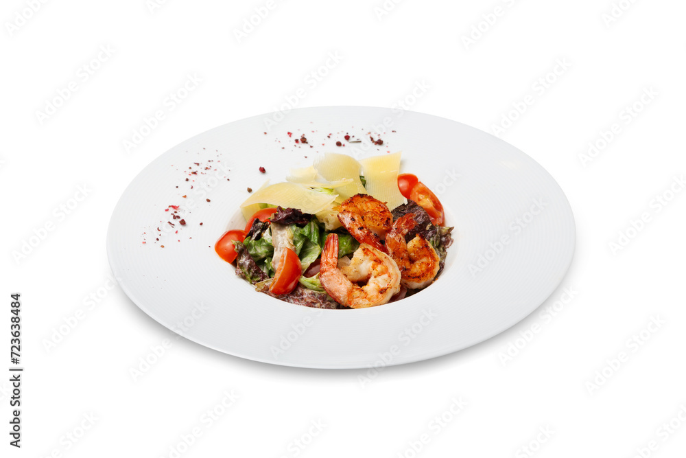 Caesar salad with shrimp on a plate, isolated Caesar salad with shrimp on a plate, isolated