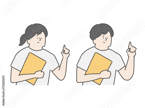 ファイルを持ちながら指差しをする男女の介護士