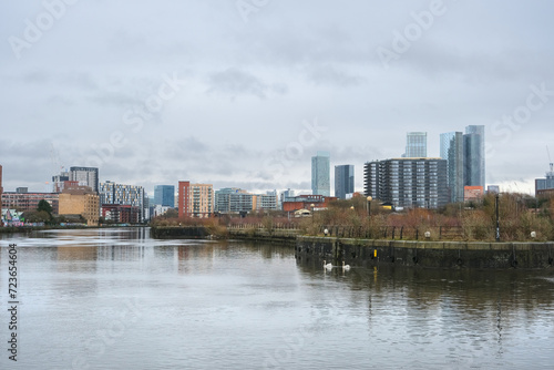 Buildings, residences and panorama, seen from a tourist boat, on the Manchester canal. © Igor