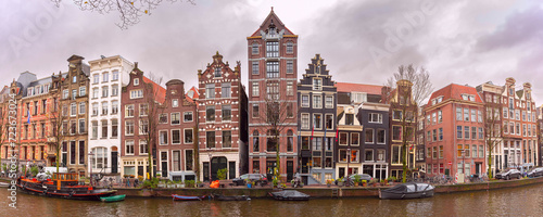 Panorama of Amsterdam canal Herengracht with typical dutch houses, Holland, Netherlands. photo
