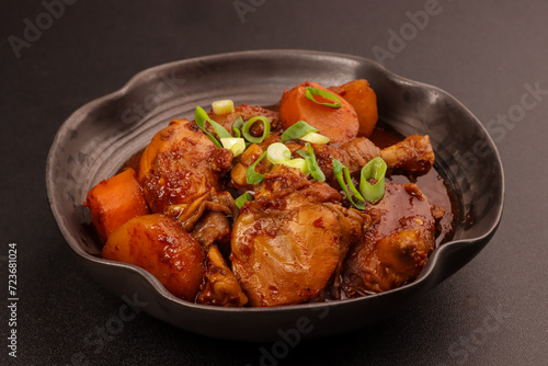 Dakdoritang is a Korean Red Spicy Braised Chicken Dish.