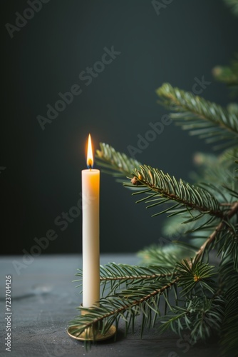 candle and spruce tree