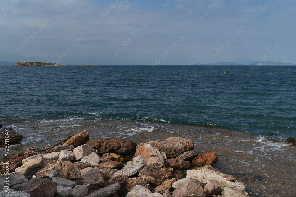 Rocky shore of the Myrto Sea on a summer day. Rocky shore of the Myrto Sea on a summer day.