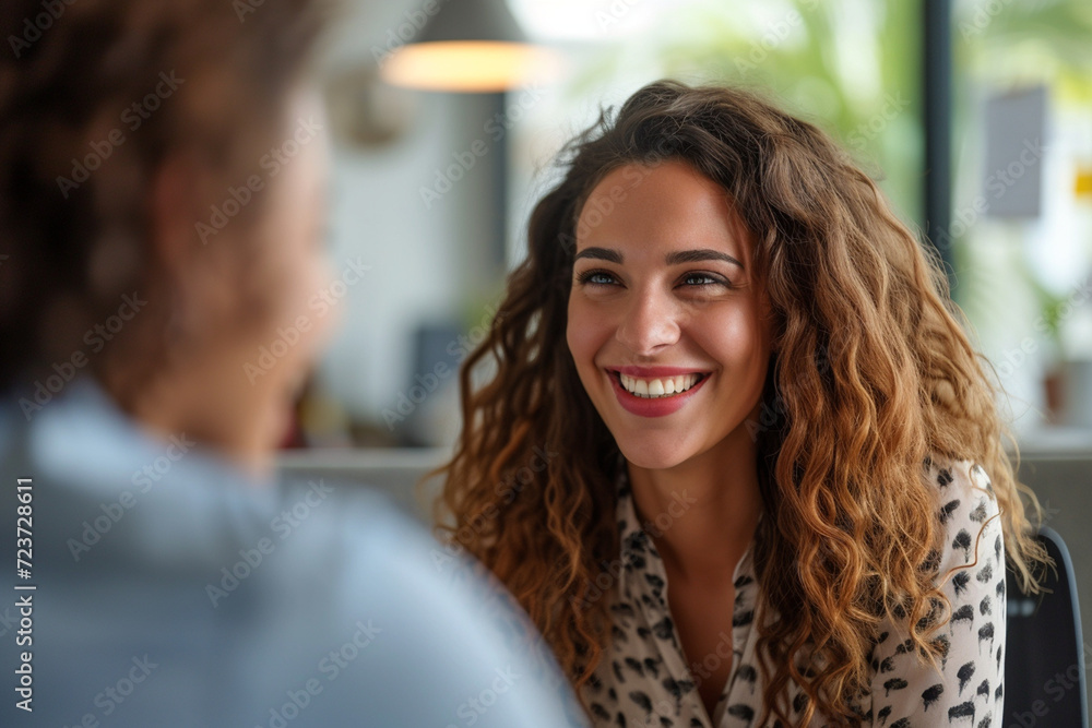 Happy businesswoman interviewing a well-prepared job candidate in a cozy office environment. The job interview process - from expectation to excitement, captured in high-definition Happy businesswoman interviewing a well-prepared job candidate in a cozy office environment. The job interview process - from expectation to excitement, captured in high-definition