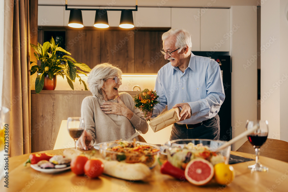 A senior couple is celebrating valentine's day at home. A senior couple is celebrating valentine's day at home.