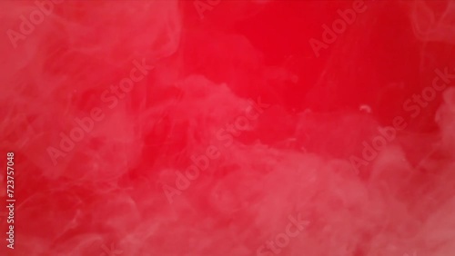 red background video with light puffs of smoke for background of words and greeting sentences photo