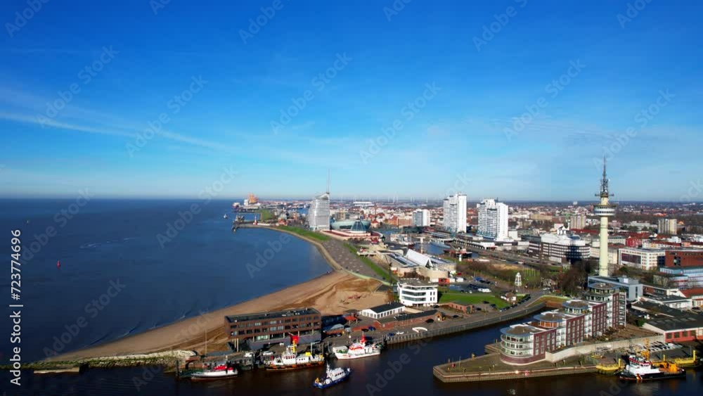 Bremerhaven - Germany - breathtaking landing aerial aerial view with a view of the departing ferry Bremerhaven - Germany - breathtaking landing aerial aerial view with a view of the departing ferry