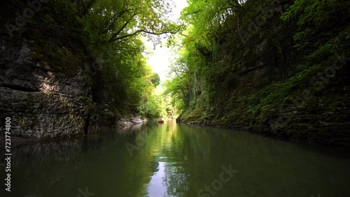 Rafting on a boat, kayak, SUP board Beautiful canyon mountain river, christal blue water, green tree. Travel and active life style. Vacation. Martvili in Georgia near Kutaisi