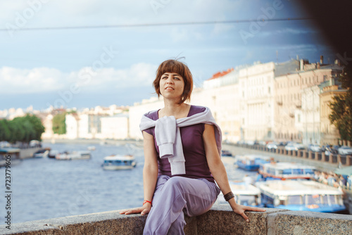 A girl in the city on a sunny day