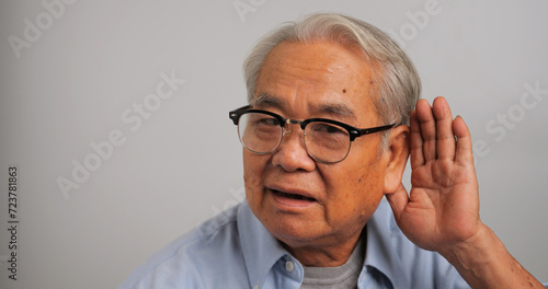 Asian old man couldn't hear the cause of his deafness.