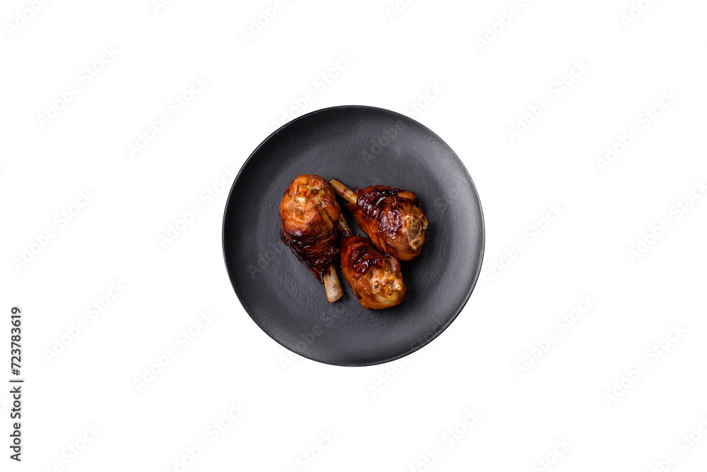 Delicious grilled chicken legs with spices and herbs in teriyaki sauce Delicious grilled chicken legs with spices and herbs in teriyaki sauce
