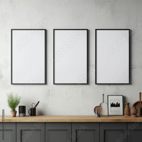 Kitchen With Three Framed Pictures on Wall