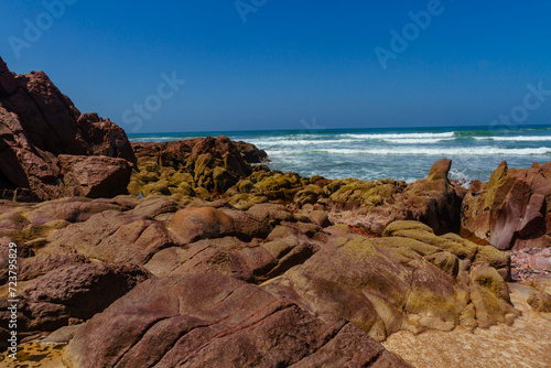 Picturesque coastal red rocks on the Atlantic Ocean coast.Legzira beach ( ore Gzira).  Morocco, Africa. © krysek