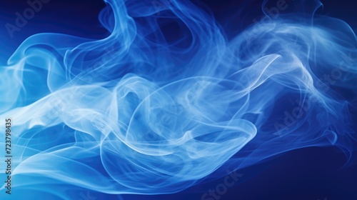 Close-up shot of blue smoke on a black background. Perfect for creating a mysterious or ethereal atmosphere