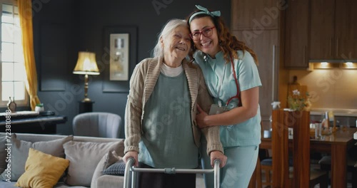 Portrait of a home health care nurse caregiver and old woman with a walker, smiling and  looking at the camera photo