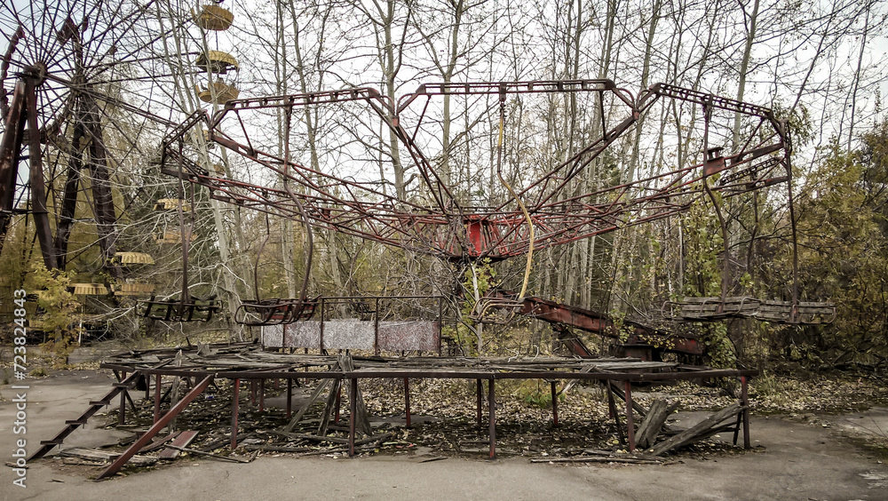 ruins of the carousel in an abandoned amusement park in Chernobyl