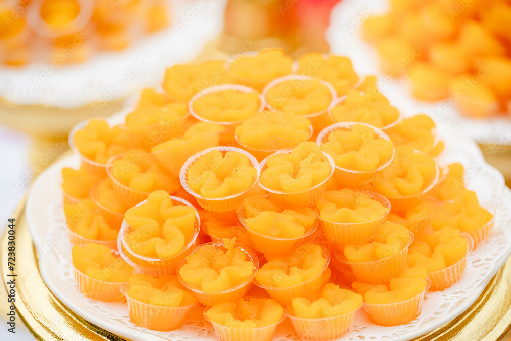 Delicious yellow Thai desserts on the table Delicious yellow Thai desserts on the table