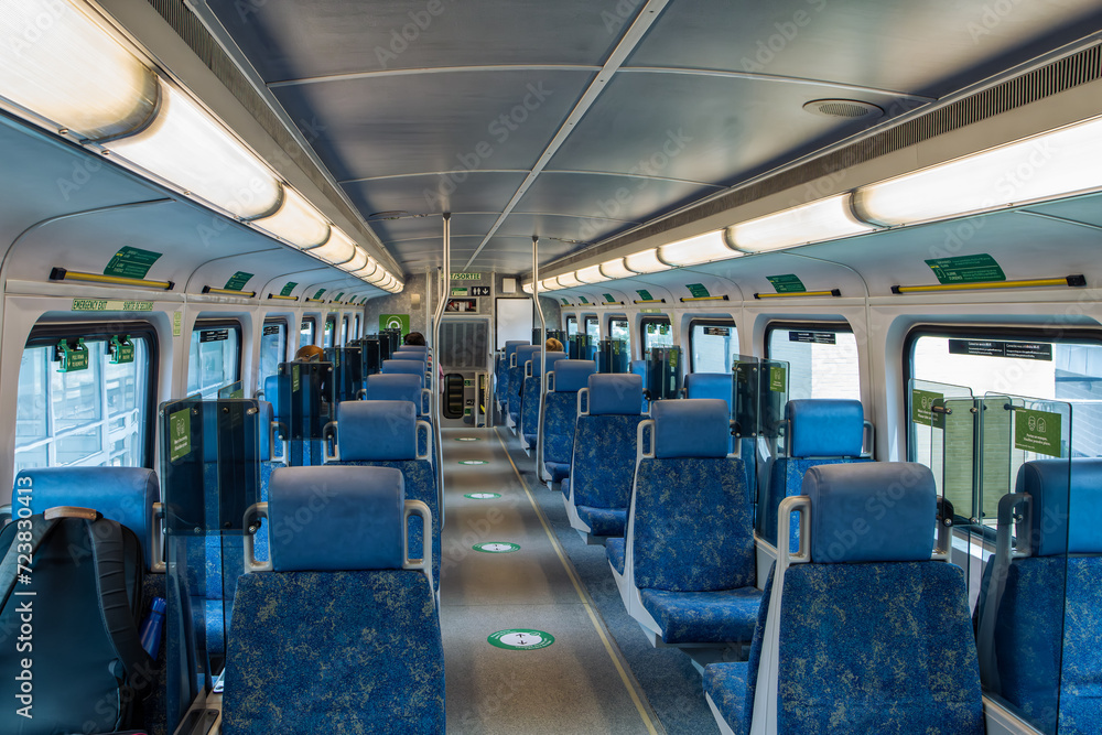 Interior of the GO Transit Go Train carriage still keeping the seat and acrylic divider from the pandemic years. Interior of the GO Transit Go Train carriage still keeping the seat and acrylic divider from the pandemic years.