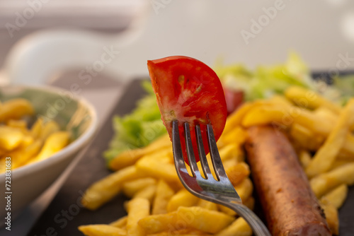 tomato on a metalic fork