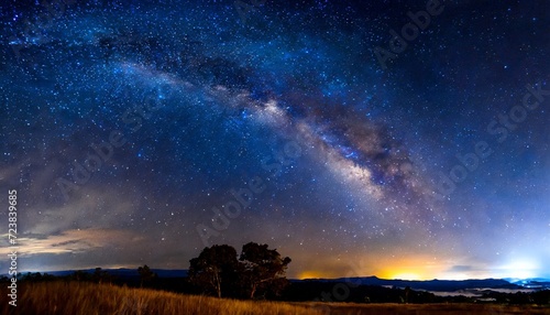 amazing panorama blue night sky milky way and star on dark background universe filled with stars nebula and galaxy with noise and grain photo by long exposure and select white balance selection focus photo